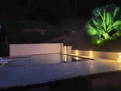 a night view of a skate park with a palm tree at Finca Familiar Talena in Sopetran