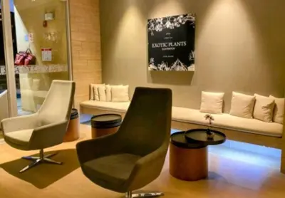 a room with two chairs and a couch in a store at Urban studios luxurious apartment in the poblado in Medellín