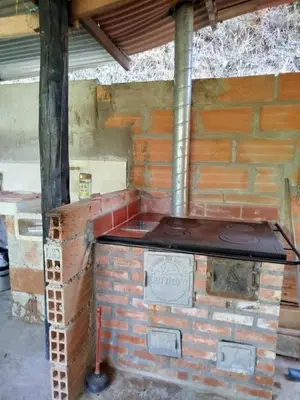 an outdoor brick oven in a brick wall at Finca el Eden in San Luis