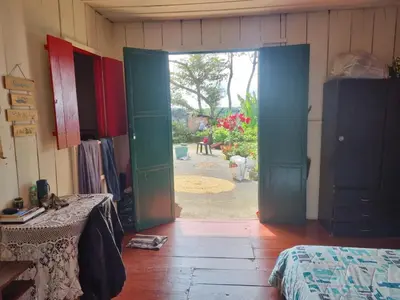 an open door in a room with a room with a table at Finca La Carolina in Palocabildo
