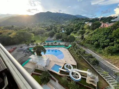 a view of a swimming pool with mountains in the background at Mountain View Pool & Slide AC 5min to Town in Santa Fe de Antioquia