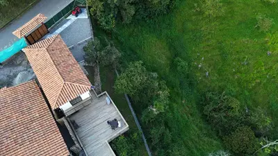 an overhead view of a man sitting on a wooden deck at Sedonascapes in Palmitas