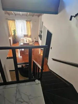 an aerial view of a living room and dining room at Casa luz in Medellín