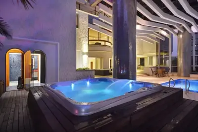 a large bathroom with a hot tub in a house at Stunning Luxury Penthouse with SPA and Concierge in Medellín