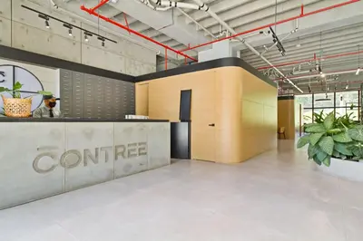 an office lobby with a coffee counter and potted plants at Apartamento exclusivo, ideal para familias grandes con una vista sensacional in Medellín