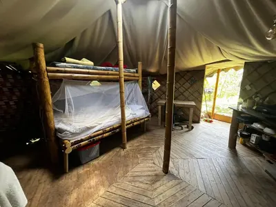 a bedroom with a bed in a tent at Cabaña en reserva natural in San Rafael
