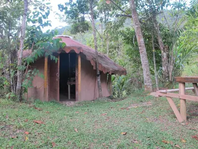 a small shack in the middle of a forest at Cabaña en reserva natural in San Rafael