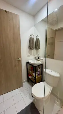 a bathroom with a toilet and a sink at Loft con Patio privado in Medellín