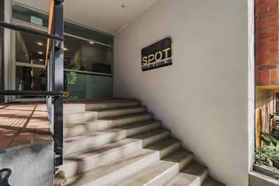 a set of stairs in front of a building at Spot Building - Apartments in Medellín