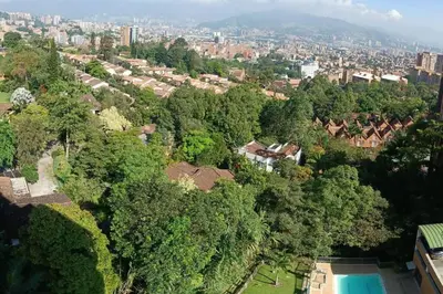 an aerial view of a city with houses and trees at City views Air-conditioning Heated pool in Envigado