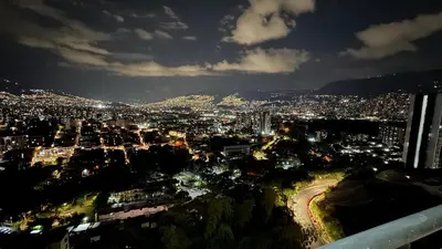a view of a city at night with lights at Rodeo Alto in Belén