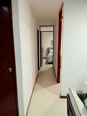 a hallway leading to a bedroom in a house at Apartment in Poblado - Medellín in Medellín