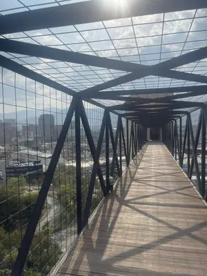 a walkway on the top of the bridge at Apartment in Poblado - Medellín in Medellín