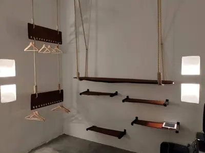 a room with several wooden shelves on a wall at TerraMonte in Honda