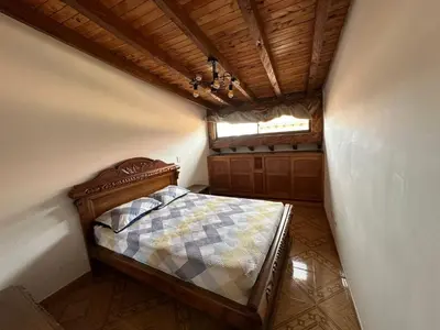 a bedroom with a bed in a small room at Apartamento Edicio Torreón en Rionegro in Rionegro