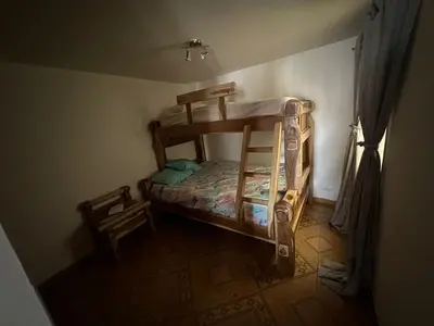 a bedroom with a bunk bed in a room at Apartamento Edicio Torreón en Rionegro in Rionegro