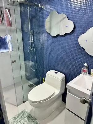 a bathroom with a toilet and a shower at Luxury Home Medellin in El Poblado