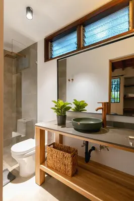 a bathroom with a sink and a toilet at Casa Serena Provenza in Medellín