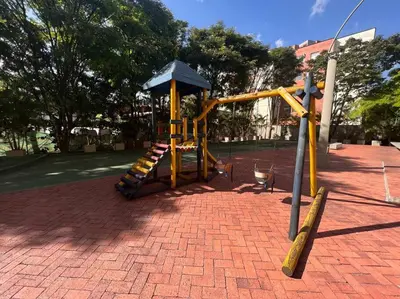 a playground with a slide in a park at Envigado Sereno in Envigado