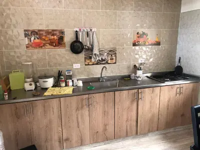 a kitchen with a sink and a counter top at habitacion amoblada in Sonsón