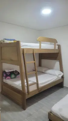 a couple of bunk beds in a room at Vista de lujo en Guatapé in Guatapé
