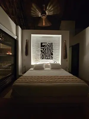 a bedroom with a large bed and a window at Villa en La Pintada con Piscina in La Pintada