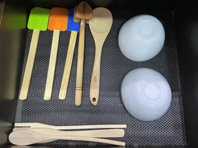 a drawer filled with wooden utensils and chop sticks at Elegance in Provenza in El Poblado