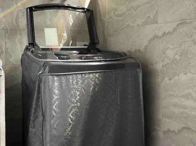 a black suitcase is sitting against a wall at 15 mins to Jardín Spacious & Convenient House in Los Andes