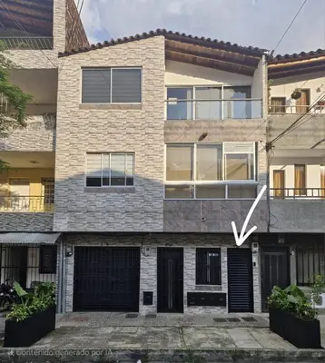 an image of a house with an arrow pointing up at 302 Apartamento Completo en Medellín in Medellín