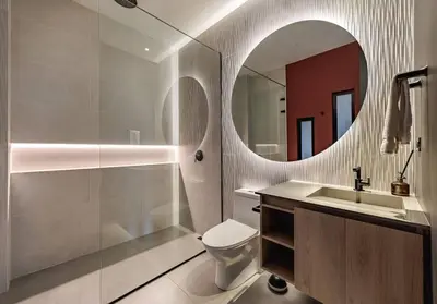a bathroom with a toilet and a sink and a mirror at Luxurious Farm House in Rionegro