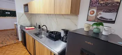 a kitchen with a sink and a counter top at Luxury Room San Nicolás Mall in Rionegro