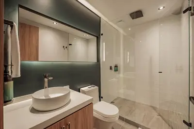 a bathroom with a sink and a toilet and a shower at H10 - Provenza in Medellín