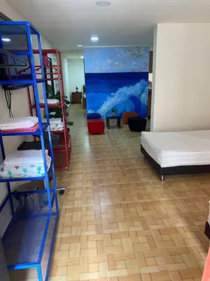 a room with two bunk beds and a bed at Acogedor loft, para 4 huéspedes Medellín Antioquia in Medellín