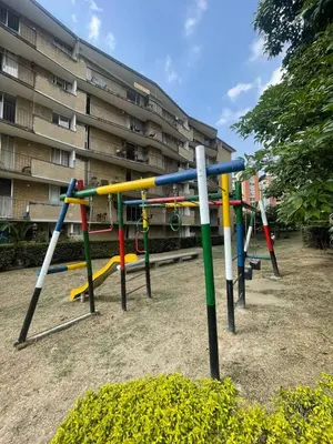a group of playground equipment in front of a building at Apartment in Palmas - Poblado in Medellín