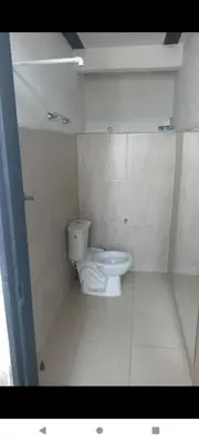 a bathroom with a white toilet in a room at Finca Barbosa Antioquia in Fredonia