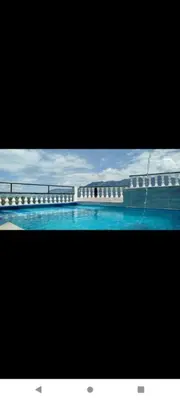 a picture of a swimming pool with a building at Finca Barbosa Antioquia in Fredonia