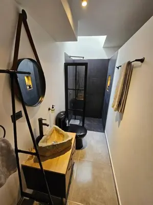 a bathroom with a sink and a toilet at Estupendo Loft en El Poblado in Medellín