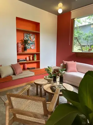 a living room with a couch and a table at Son de la Loma Apartments in Envigado