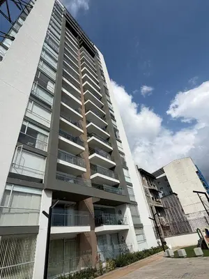 a tall building with balconies on the side of it at Amplio y Suntuoso - estrato 6 in Manizales