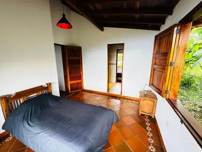 a bedroom with a bed in a room at My Paradise Tamesis in Támesis