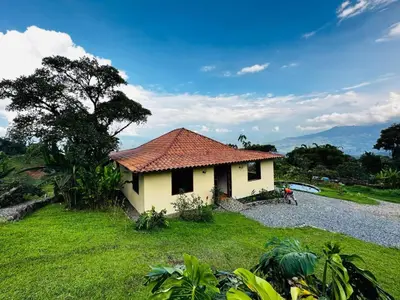 a small yellow house with a red roof at My Paradise Tamesis in Támesis