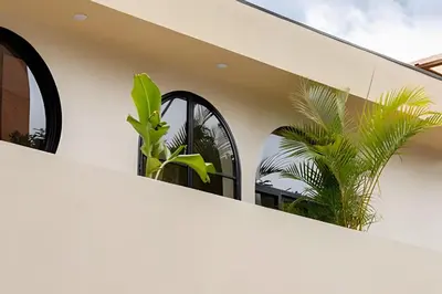 a house with plants on the side of it at Casa Fiora Laureles in Medellín