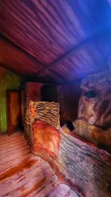 a painting of a bed in a room at Hotel Golden Hills Manizales in Manizales