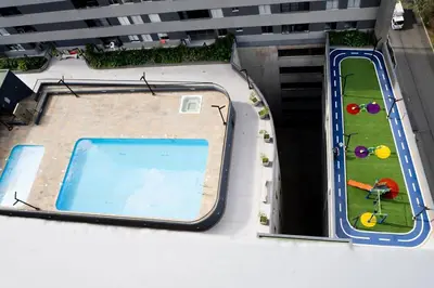 an overhead view of a swimming pool on a building at Amazing cozy & new flat 3 bedrooms in Medellin best location in Medellín