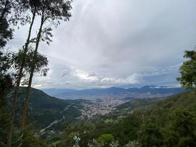 a view of a city from a mountain at Refugio Santa Elena in Santa Elena