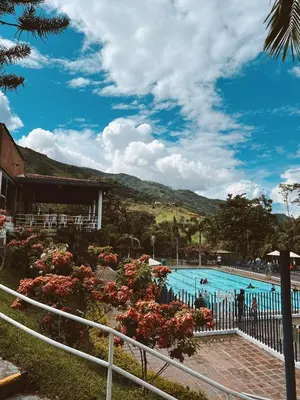 a view of the pool at a resort at Yarumito Finca Hotel Cabaña Narciso in Barbosa