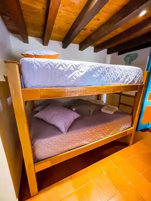 two bunk beds sitting on top of a room at Suite Master in Jericó