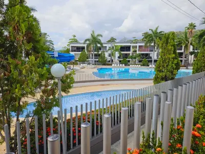 a view of the pool from the balcony of a resort at Apartasol Ciudadela Santa Fé 