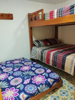 a bedroom with two bunk beds and a bed at Jericó un pueblo de ensueño in Jericó