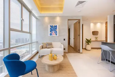 a living room with a couch and a table at Bio 26 Apartments in Medellín